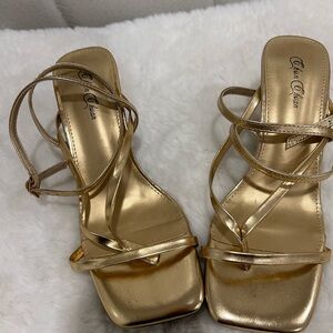 Gold heels ,